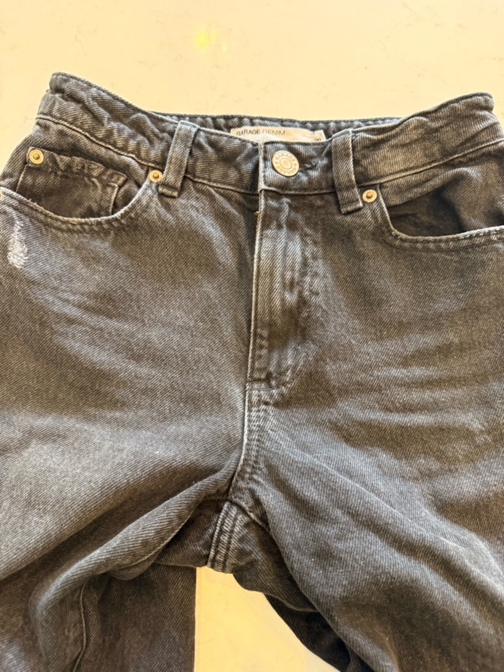 Garage high rise, wide leg, distressed Jeans in Washed Black